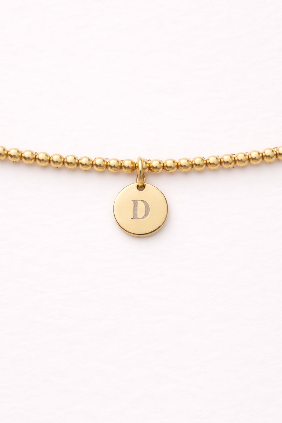 Engraved Circle Charm Beaded Bracelet