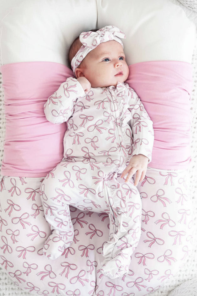 Blushing Bows Ruffle Zipper Footie